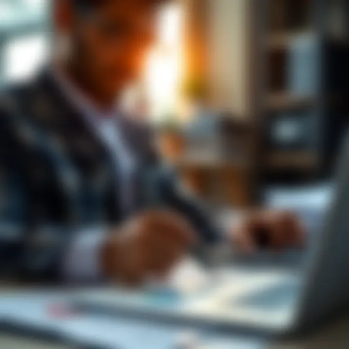 Close-up of a businessperson reviewing export documentation with charts and a laptop